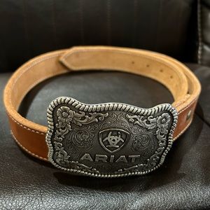 Women’s brown belt and Ariat belt buckle